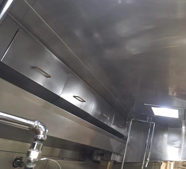 Restaurant exhaust hood and filters cleaned to bare stainless steel by Commercial Hood Solutions